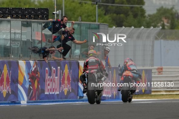 Ogura Ai wins under the finish flag during the Gran Premio Red Bull di San Marino e della Riviera di Rimini Grand Prix Race MotoGP on Sunday...