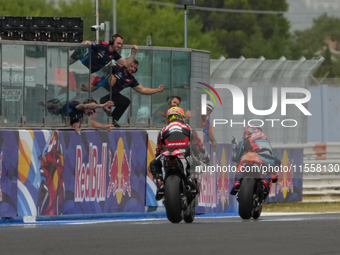 Ogura Ai wins under the finish flag during the Gran Premio Red Bull di San Marino e della Riviera di Rimini Grand Prix Race MotoGP on Sunday...