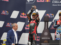 Canet Aron stands on the podium during the Gran Premio Red Bull di San Marino e della Riviera di Rimini Grand Prix Race MotoGP on Sunday at...