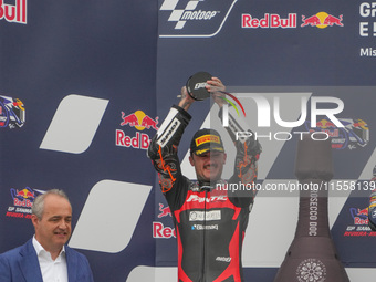 Canet Aron stands on the podium during the Gran Premio Red Bull di San Marino e della Riviera di Rimini Grand Prix Race MotoGP on Sunday at...