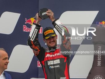 Canet Aron stands on the podium during the Gran Premio Red Bull di San Marino e della Riviera di Rimini Grand Prix Race MotoGP on Sunday at...