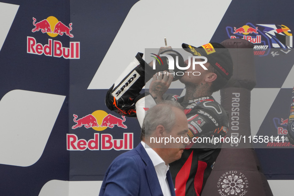 Canet Aron stands on the podium during the Gran Premio Red Bull di San Marino e della Riviera di Rimini Grand Prix Race MotoGP on Sunday at...