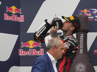 Canet Aron stands on the podium during the Gran Premio Red Bull di San Marino e della Riviera di Rimini Grand Prix Race MotoGP on Sunday at...