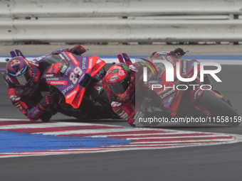 Francesco Bagnaia and Jorge Martin participate in the Gran Premio Red Bull di San Marino e della Riviera di Rimini Grand Prix Race MotoGP on...