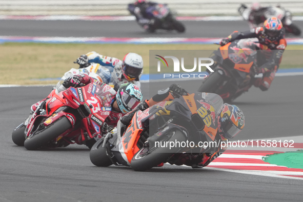 Brad Binder and Enea Bastianini participate in the Gran Premio Red Bull di San Marino e della Riviera di Rimini Grand Prix Race MotoGP on Su...