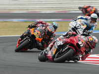 Pedro Acosta and Brad Binder participate in the Gran Premio Red Bull di San Marino e della Riviera di Rimini Grand Prix Race MotoGP on Sunda...