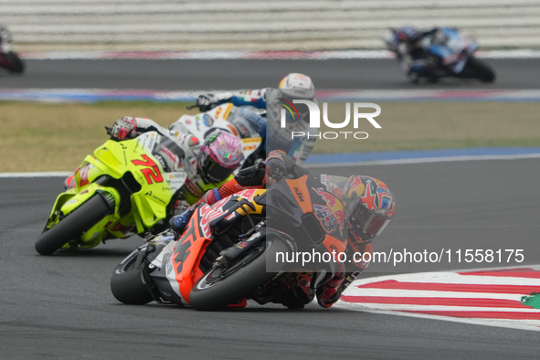 Jack Miller and Marco Bezzecchi participate in the Gran Premio Red Bull di San Marino e della Riviera di Rimini Grand Prix Race MotoGP on Su...