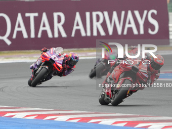 Francesco Bagnaia and Jorge Martin participate in the Gran Premio Red Bull di San Marino e della Riviera di Rimini Grand Prix Race MotoGP on...