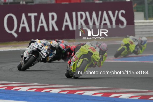 Marco Bezzecchi and Alex Marquez participate in the Gran Premio Red Bull di San Marino e della Riviera di Rimini Grand Prix Race MotoGP on S...