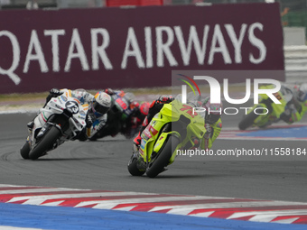 Marco Bezzecchi and Alex Marquez participate in the Gran Premio Red Bull di San Marino e della Riviera di Rimini Grand Prix Race MotoGP on S...