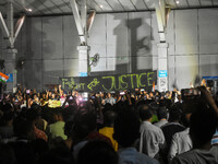 Citizens participate in a night vigil as the protest against the rape and murder of a second-year PGT doctor enters its 30th consecutive day...