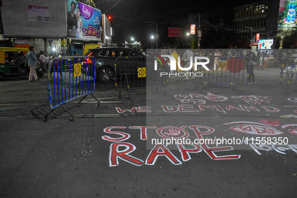 Citizens participate in a night vigil as the protest against the rape and murder of a second-year PGT doctor enters its 30th consecutive day...