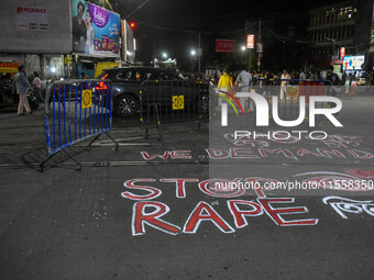 Citizens participate in a night vigil as the protest against the rape and murder of a second-year PGT doctor enters its 30th consecutive day...