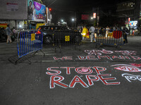 Citizens participate in a night vigil as the protest against the rape and murder of a second-year PGT doctor enters its 30th consecutive day...