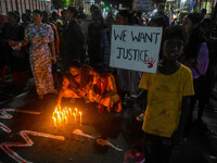 Citizens participate in a night vigil as the protest against the rape and murder of a second-year PGT doctor enters its 30th consecutive day...