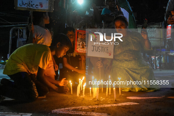 Citizens participate in a night vigil as the protest against the rape and murder of a second-year PGT doctor enters its 30th consecutive day...