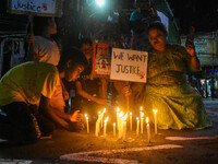 Citizens participate in a night vigil as the protest against the rape and murder of a second-year PGT doctor enters its 30th consecutive day...