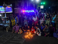 Citizens participate in a night vigil as the protest against the rape and murder of a second-year PGT doctor enters its 30th consecutive day...