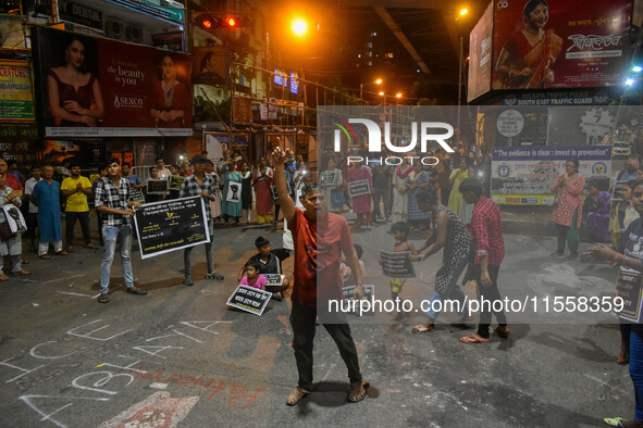 Citizens participate in a night vigil as the protest against the rape and murder of a second-year PGT doctor enters its 30th consecutive day...