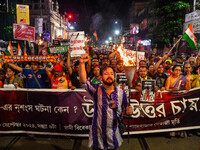 Citizens participate in a night vigil as the protest against the rape and murder of a second-year PGT doctor enters its 30th consecutive day...