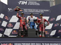 Francesco Bagnaia of Italy and Ducati Lenovo Team (L), Marc Marquez of Spain and Gresini Racing MotoGP (C), and Enea Bastianini of Italy and...