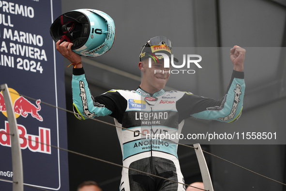 Angel Piqueras and Spain and Leopard Racing celebrate the victory of the Moto3 Race of MotoGP of San Marino at Misano World Circuit in Misan...