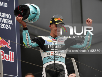 Angel Piqueras and Spain and Leopard Racing celebrate the victory of the Moto3 Race of MotoGP of San Marino at Misano World Circuit in Misan...