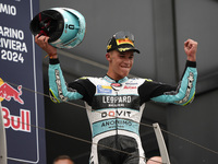 Angel Piqueras and Spain and Leopard Racing celebrate the victory of the Moto3 Race of MotoGP of San Marino at Misano World Circuit in Misan...