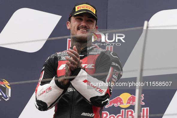 Aron Canet of Spain and Fantic Racing celebrate the second place in the Moto2 Race of MotoGP of San Marino at Misano World Circuit in Misano...