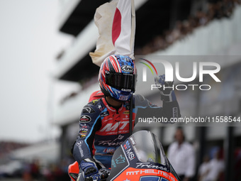 Ai Ogura of Japan and MT Helmets - MSI celebrate the victory of the Moto2 Race of MotoGP Of San Marino at Misano World Circuit in Misano Adr...