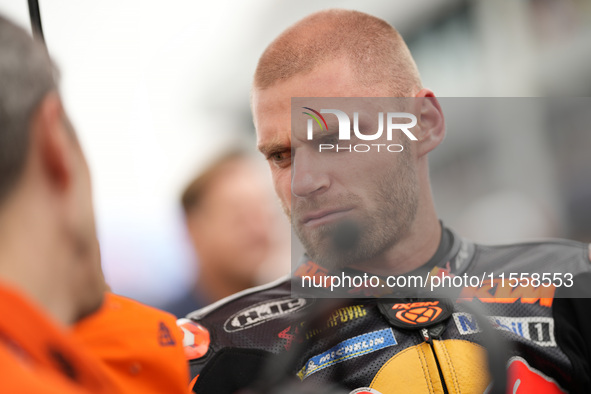 Brad Binder of South Africa and Red Bull KTM Factory Racing looks on prior to the MotoGP Race of MotoGP of San Marino at Misano World Circui...