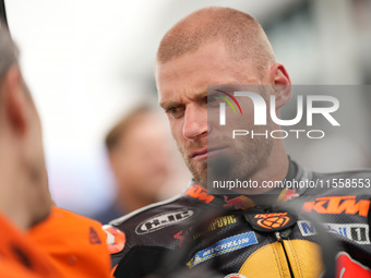 Brad Binder of South Africa and Red Bull KTM Factory Racing looks on prior to the MotoGP Race of MotoGP of San Marino at Misano World Circui...