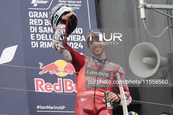 Enea Bastianini of Italy and Ducati Lenovo Team celebrates third place in the MotoGP Race of MotoGP Of San Marino at Misano World Circuit in...