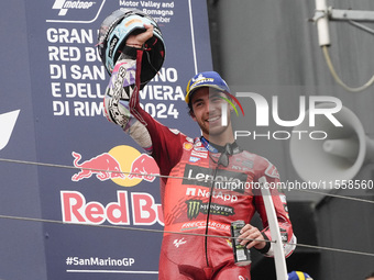 Enea Bastianini of Italy and Ducati Lenovo Team celebrates third place in the MotoGP Race of MotoGP Of San Marino at Misano World Circuit in...