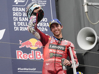 Enea Bastianini of Italy and Ducati Lenovo Team celebrates third place in the MotoGP Race of MotoGP Of San Marino at Misano World Circuit in...