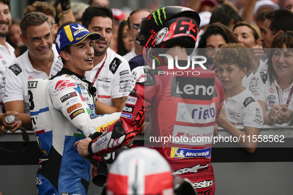 Marc Marquez of Spain and Gresini Racing MotoGP congratulates Francesco Bagnaia of Italy and Ducati Lenovo Team at the end of the MotoGP Rac...