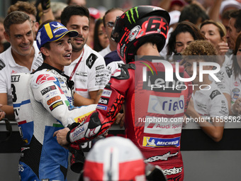 Marc Marquez of Spain and Gresini Racing MotoGP congratulates Francesco Bagnaia of Italy and Ducati Lenovo Team at the end of the MotoGP Rac...