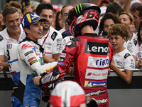 Marc Marquez of Spain and Gresini Racing MotoGP congratulates Francesco Bagnaia of Italy and Ducati Lenovo Team at the end of the MotoGP Rac...