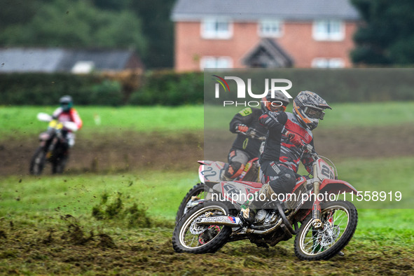 Jonathan Dowd (28) leads John Thompson (22) in the Adult Motocross Support Class during the ACU British Upright Championships in Gawsworth,...