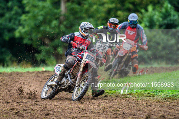 Jonathan Dowd (28) leads John Thompson (22) and Jon Dowd Snr (808) in the Adult Motocross Support Class during the ACU British Upright Champ...