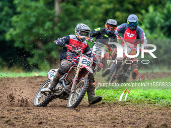 Jonathan Dowd (28) leads John Thompson (22) and Jon Dowd Snr (808) in the Adult Motocross Support Class during the ACU British Upright Champ...