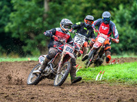 Jonathan Dowd (28) leads John Thompson (22) and Jon Dowd Snr (808) in the Adult Motocross Support Class during the ACU British Upright Champ...