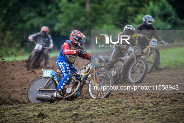 Dave Mears (19) rides outside John Shipley (29) and Alan Brook (209) in the 350cc Upright Class during the ACU British Upright Championships...