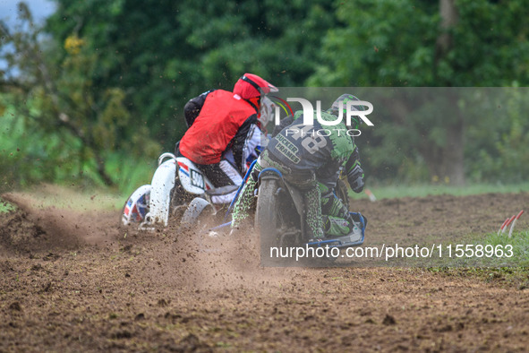 Billy Winterburn and Ryan Wharton (94) (Wharton wearing 48) ride inside Nick Bull and Nathan Alder (500) in the 1000cc Sidecar Class during...