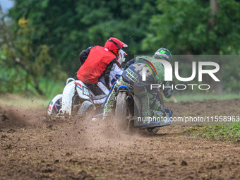 Billy Winterburn and Ryan Wharton (94) (Wharton wearing 48) ride inside Nick Bull and Nathan Alder (500) in the 1000cc Sidecar Class during...