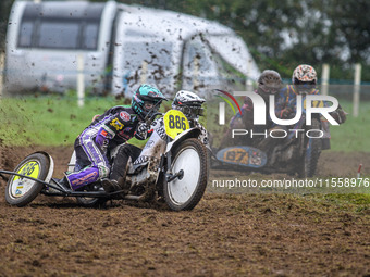 Phill Rowlands and Tom Rowlands (886) lead Richard Fred Jenner and Scott Gutteridge (87) in the 500cc Sidecar Class during the ACU British U...