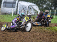 Phill Rowlands and Tom Rowlands (886) lead Richard Fred Jenner and Scott Gutteridge (87) in the 500cc Sidecar Class during the ACU British U...