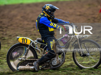 Tony Atkin (10) leaves the start and tries to hang on to his machine in the 500cc Upright Class during the ACU British Upright Championships...