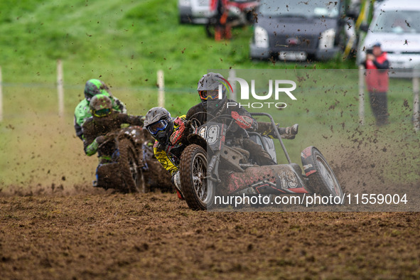 Andy Minard and Lewis Davis (19) lead Billy Winterburn and Ryan Wharton (94) in the 1000cc Sidecar Class during the ACU British Upright Cham...