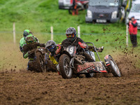 Andy Minard and Lewis Davis (19) lead Billy Winterburn and Ryan Wharton (94) in the 1000cc Sidecar Class during the ACU British Upright Cham...